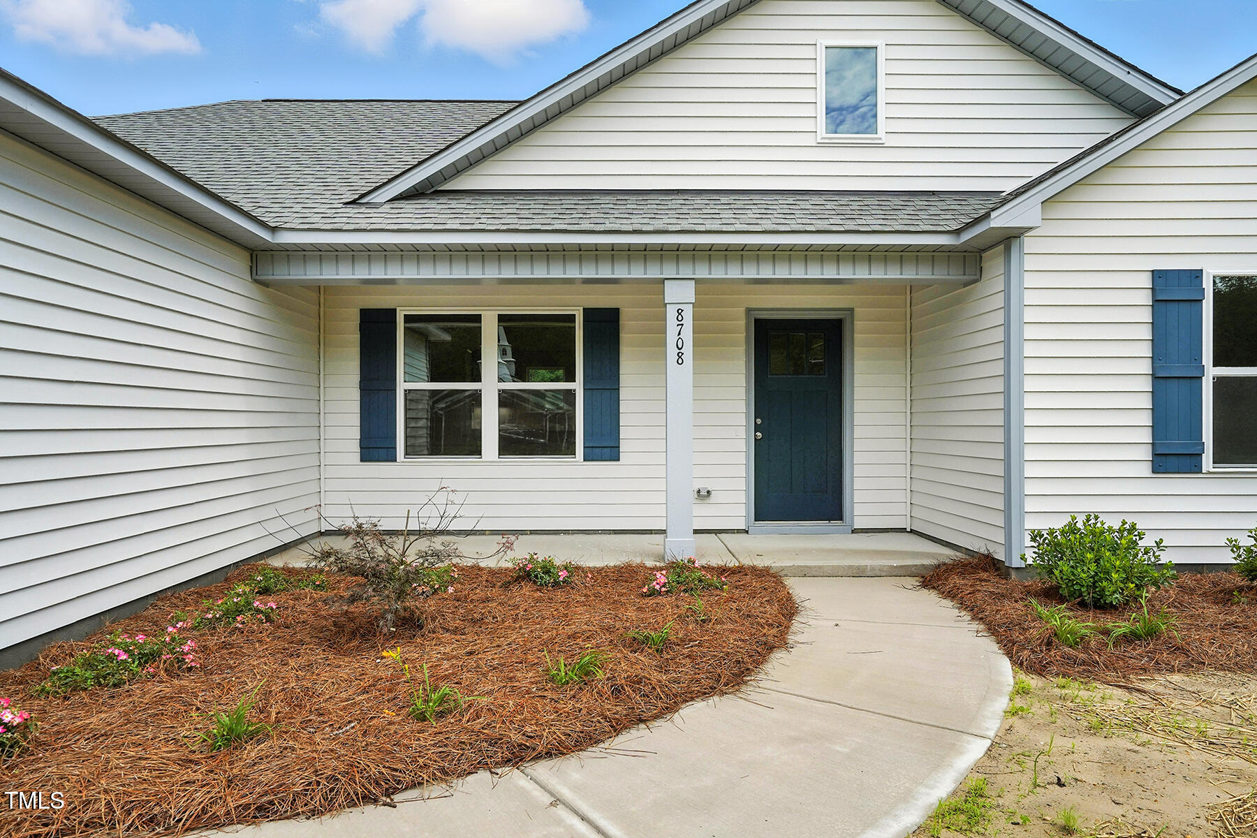 8708 Green Path Road Dunn, NC 28334 - Photo 4 of 31 a front view of a house