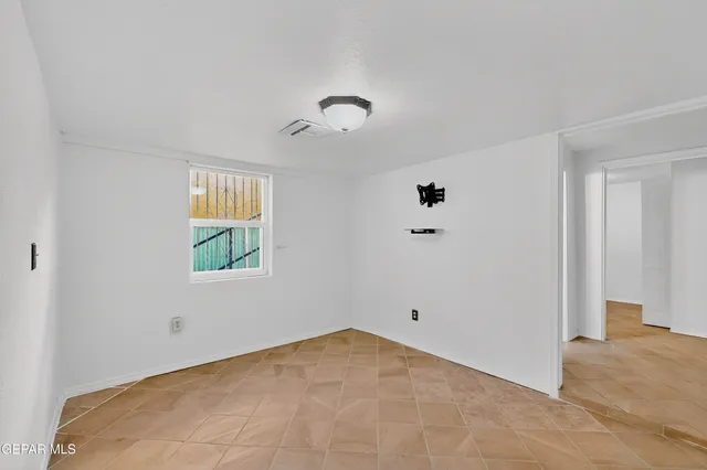 a bathroom with a shower and toilet