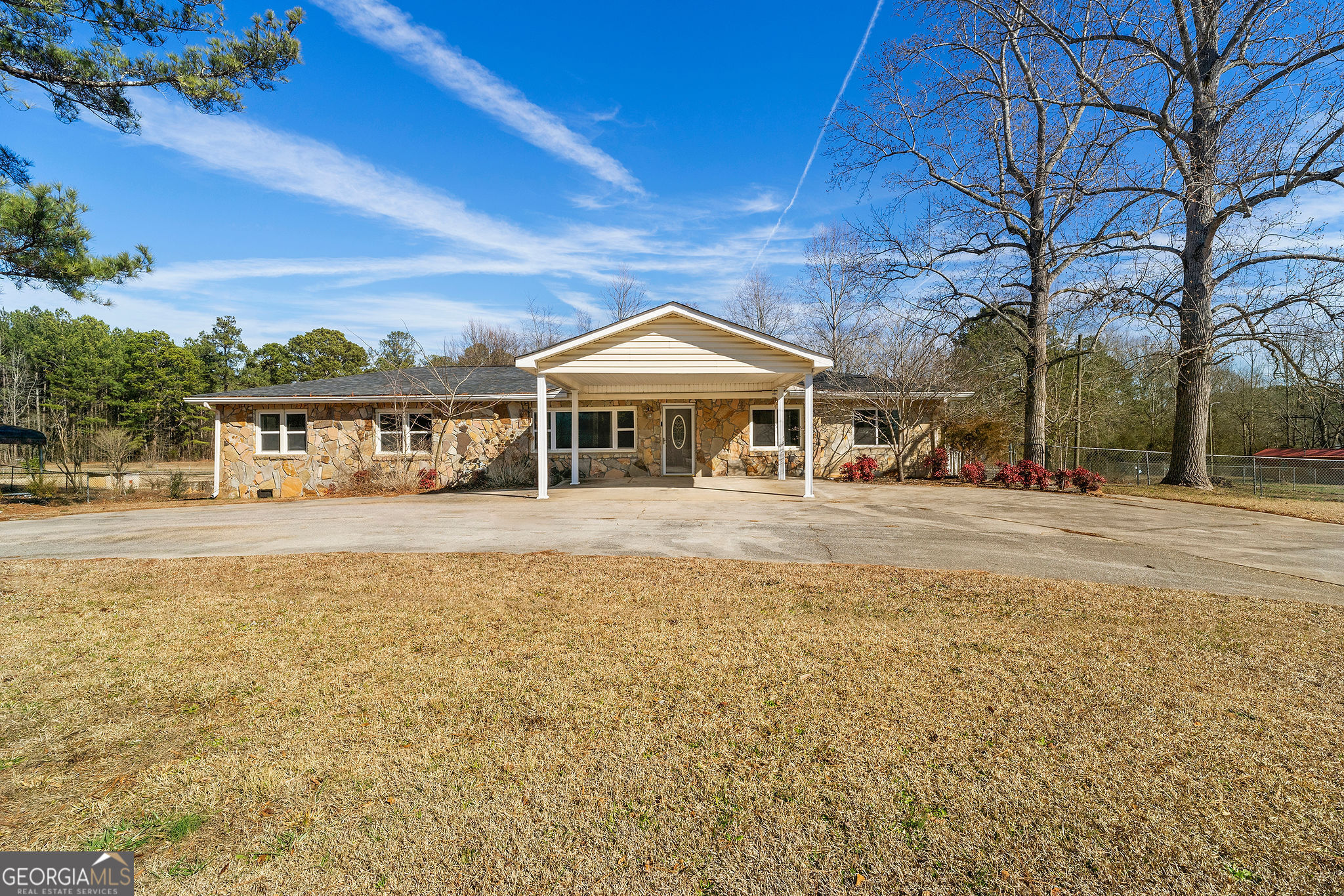 110 Gum Creek Road Oxford, GA 30054 - Photo 1 of 1 a front view of a house with a yard
