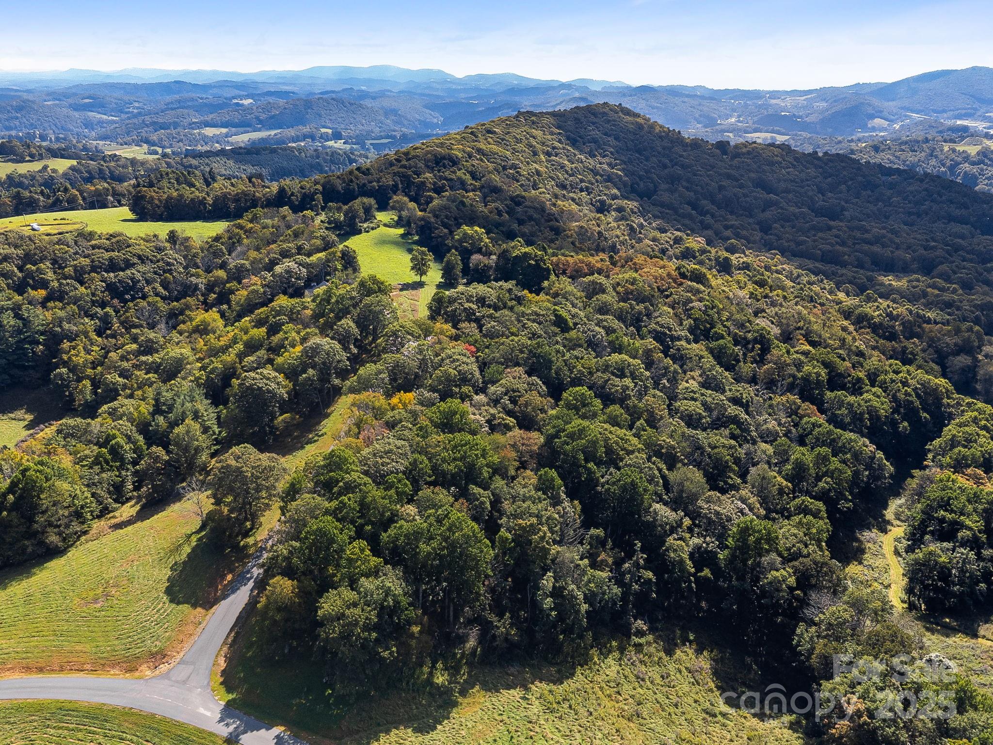 62 Poplar Forest Drive Boone, NC 28607 - Photo 23 of 27 a view of city and mountain
