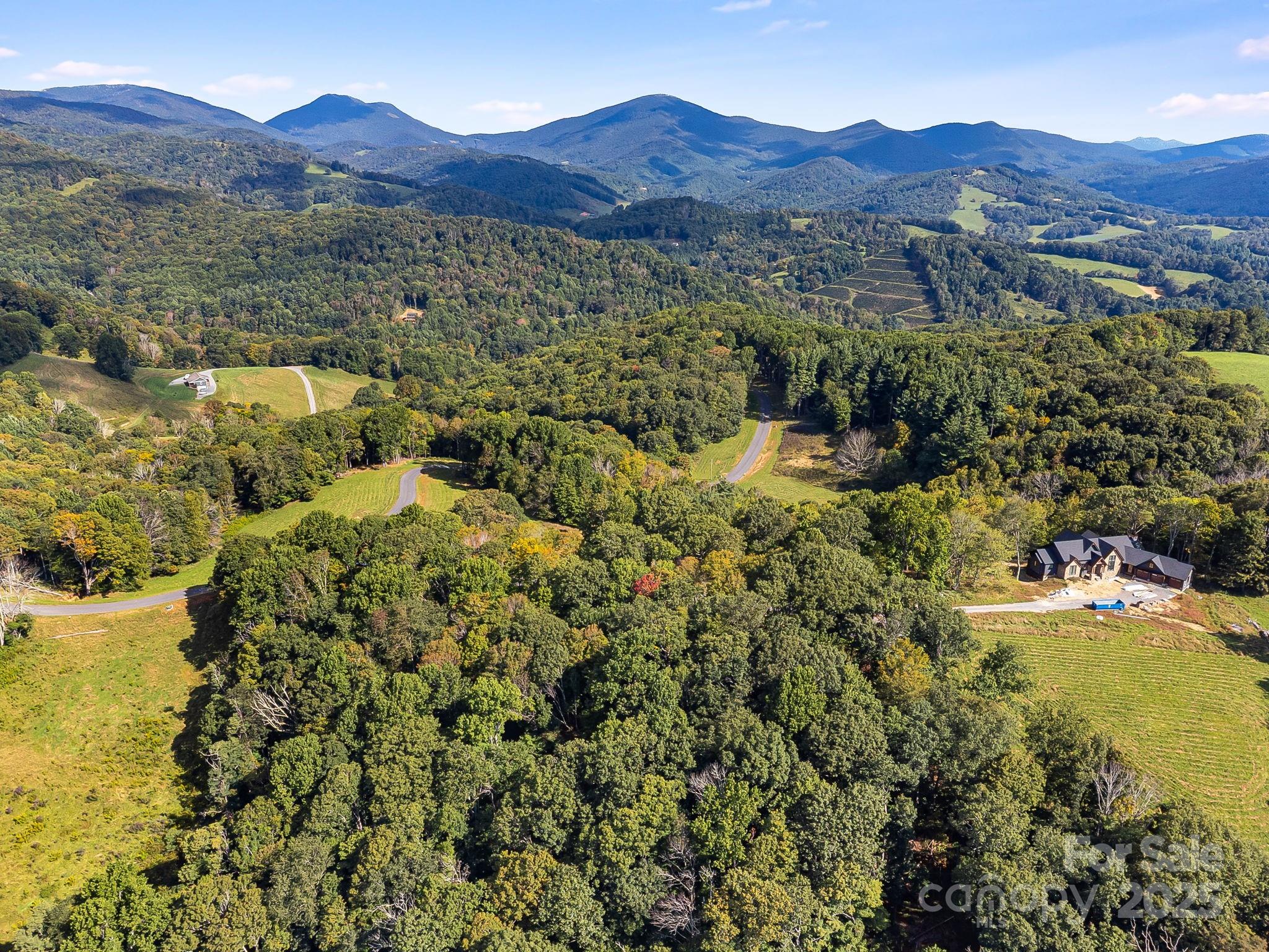 62 Poplar Forest Drive Boone, NC 28607 - Photo 3 of 27 a view of a town with mountains in the background