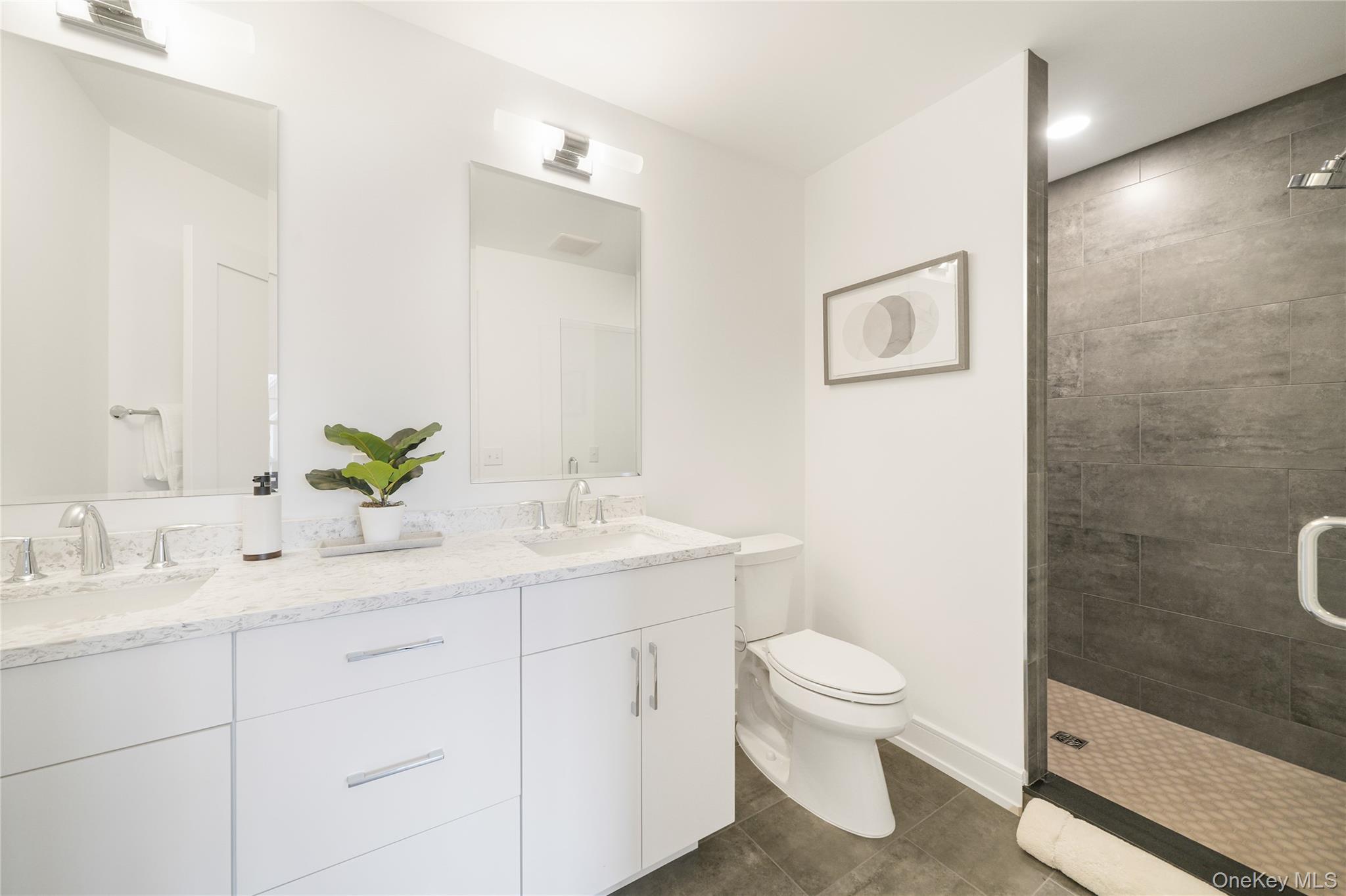 2040 Crompond Road, Unit 15 Yorktown Heights, NY 10598 - Photo 12 of 19 a bathroom with a granite countertop sink a toilet and a mirror