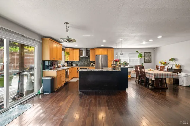 a bedroom with a bed and a workspace