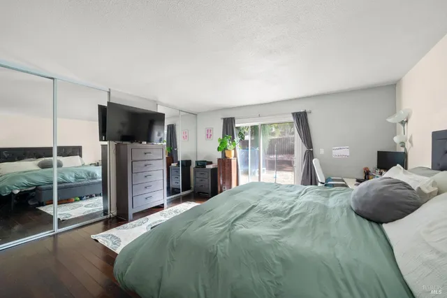 a bathroom with a sink mirror and vanity