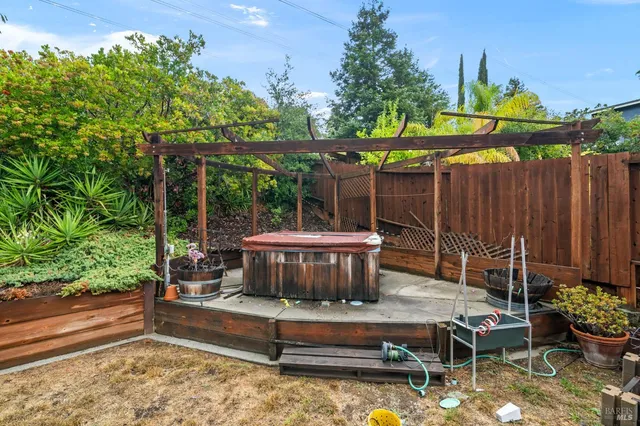 swimming pool view with a seating space