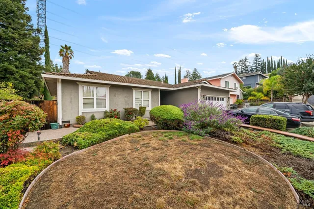 a view of a house with a patio