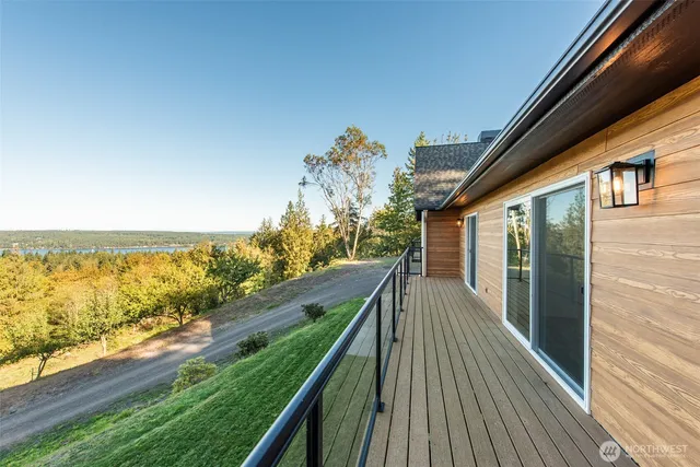 a view of balcony with furniture