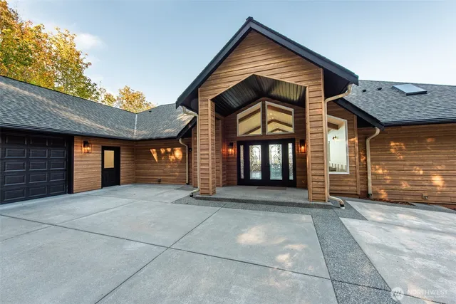 a view of a house with brick walls