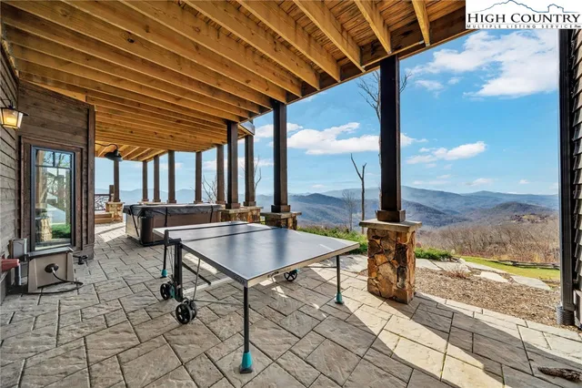 a outdoor space with chairs and outdoor view