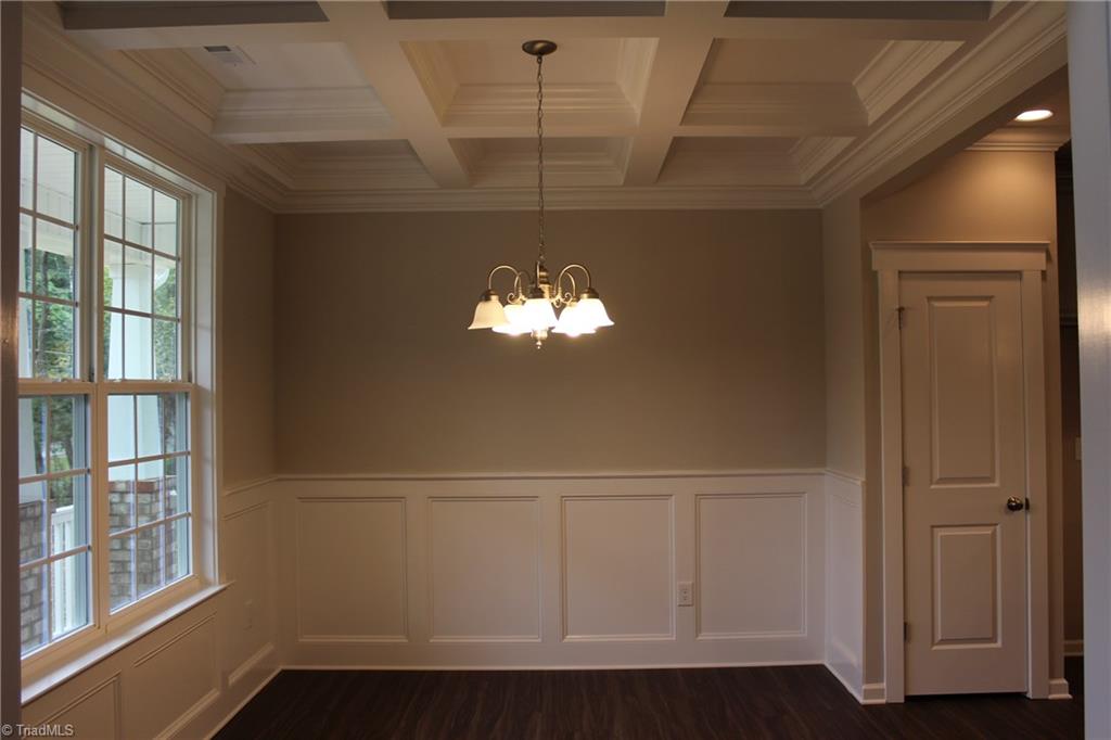 Dining Room with Wainscot and Coffered Ceilings