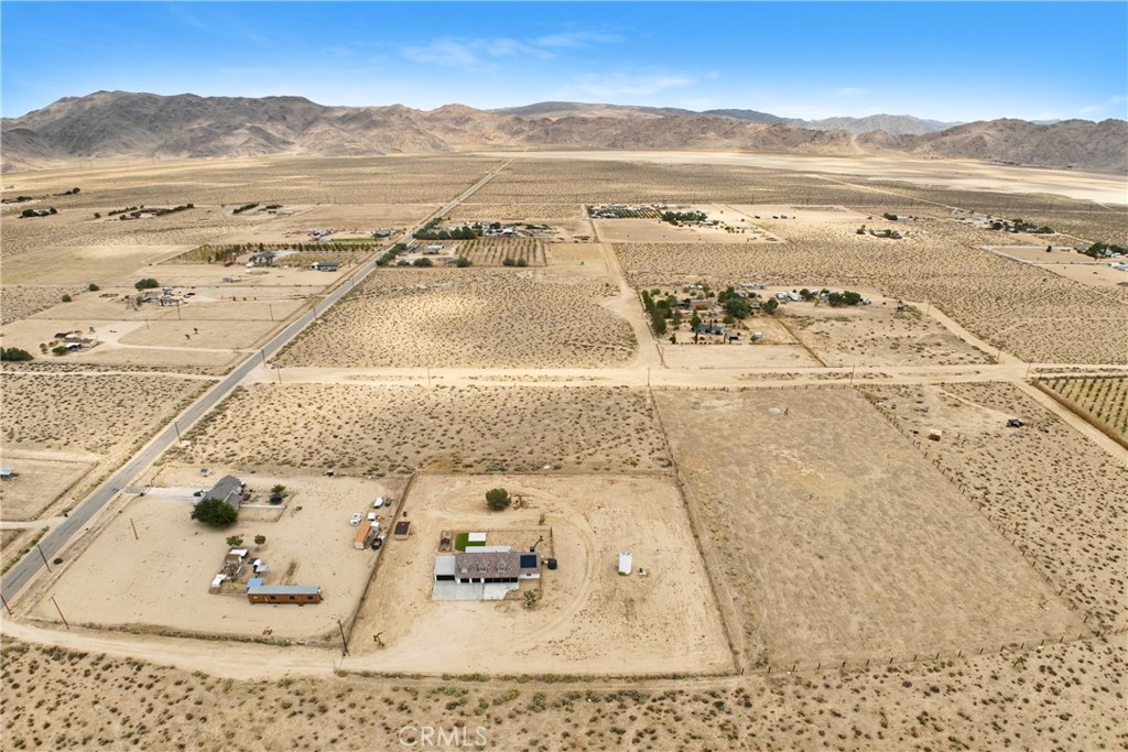 10015 High Road Lucerne Valley, CA 92356 - Photo 37 of 39 wooden floor with view of lake and mountain view