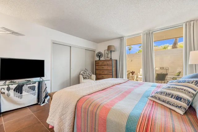 a living room with a couch and a table