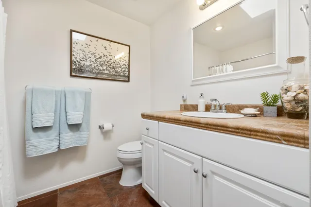 a view of a fountain in front of a house