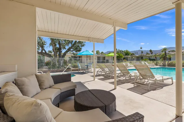 a view of residential houses with outdoor space