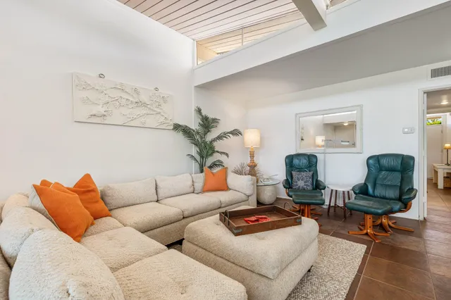 a outdoor space with lots of tables and chairs