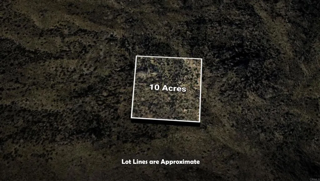 0 West Ramon Road Palm Springs, CA 92262 - Photo 2 of 4 a sign that is sitting on a brick wall