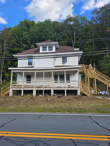 a view of a house with a balcony