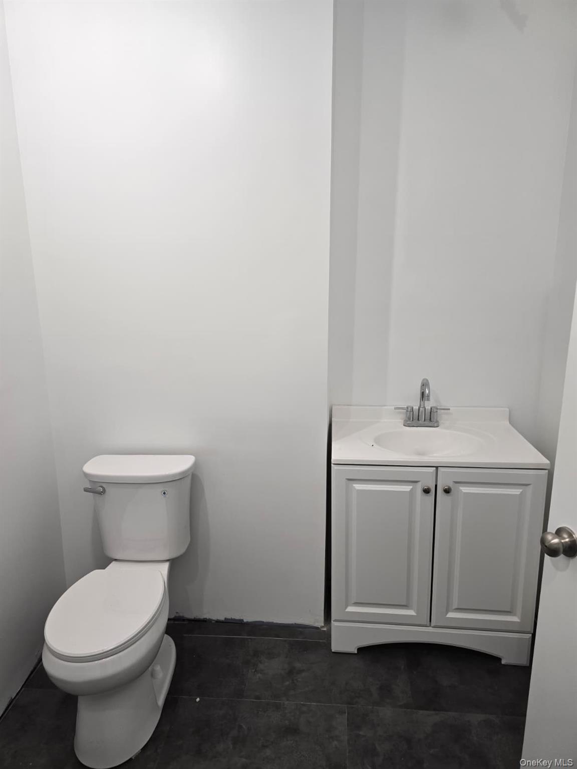 2016 Old Rte 17 Roscoe, NY 12776 - Photo 11 of 26 a bathroom with a toilet sink and mirror