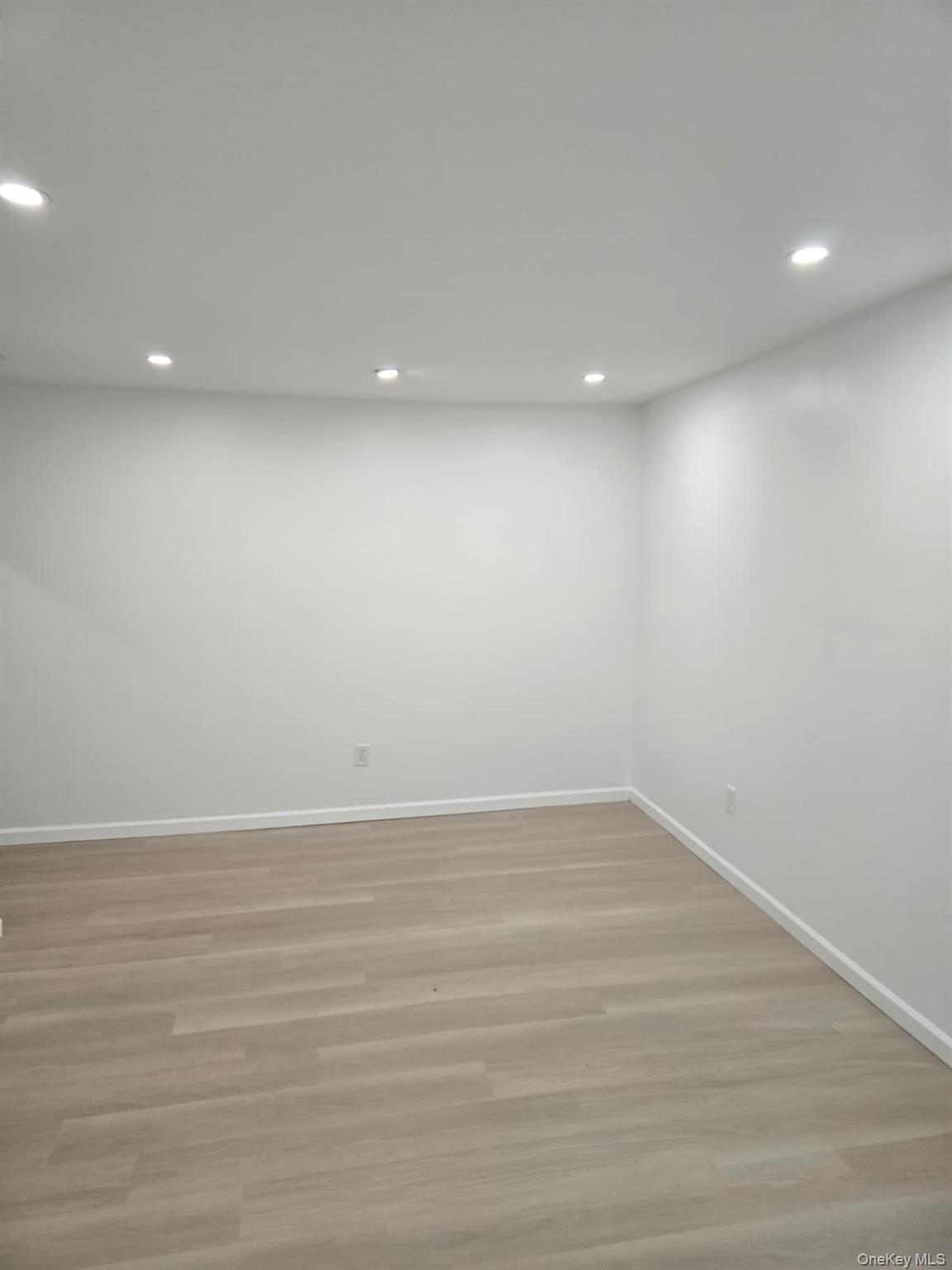 2016 Old Rte 17 Roscoe, NY 12776 - Photo 15 of 26 an empty room with wooden floor and natural light