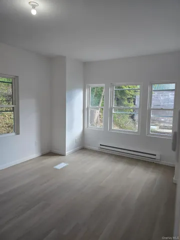 an empty room with windows