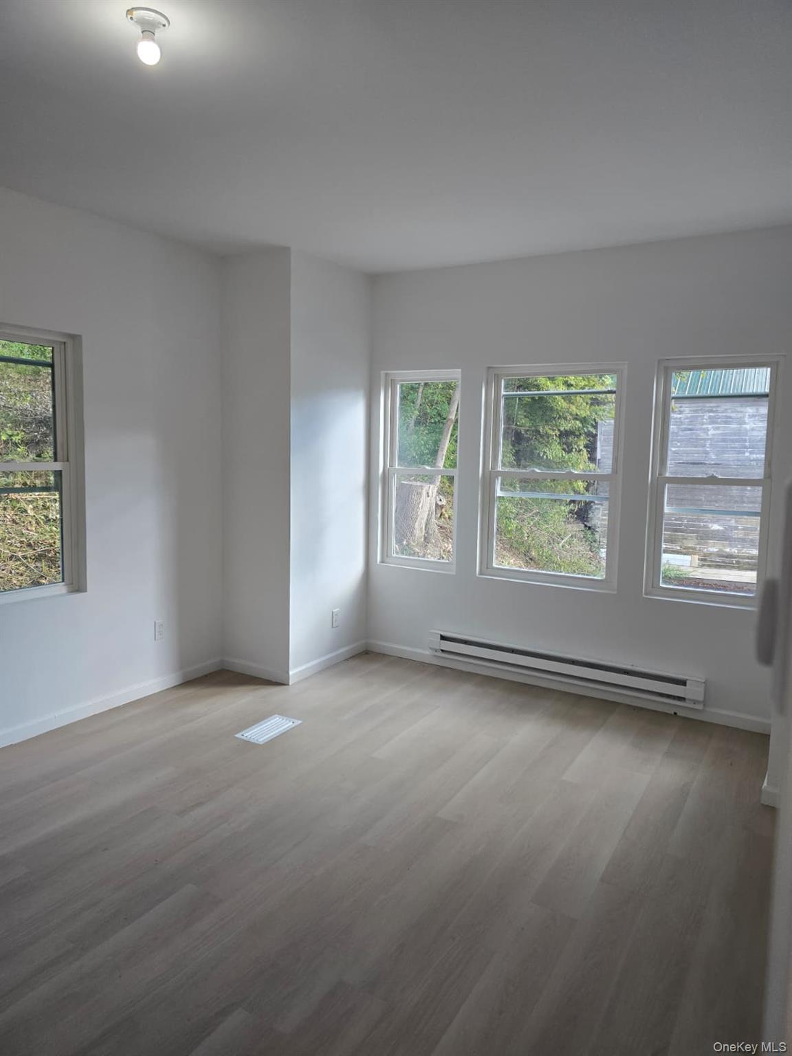 2016 Old Rte 17 Roscoe, NY 12776 - Photo 7 of 26 an empty room with windows