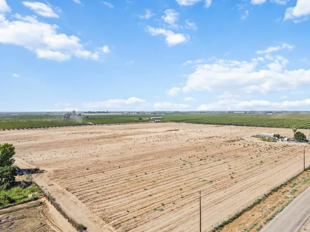 a view of a backyard of the house