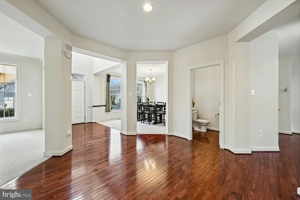 a kitchen with stainless steel appliances granite countertop refrigerator stove top oven and sink