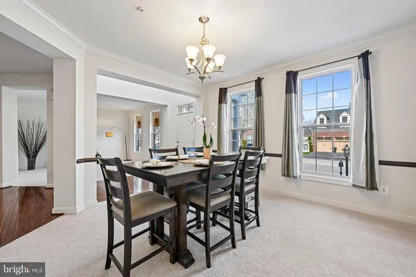 a spacious bathroom with a tub a double vanity sink and a mirror