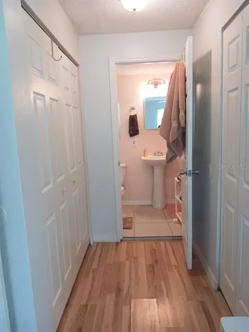 a bathroom with a sink and mirror