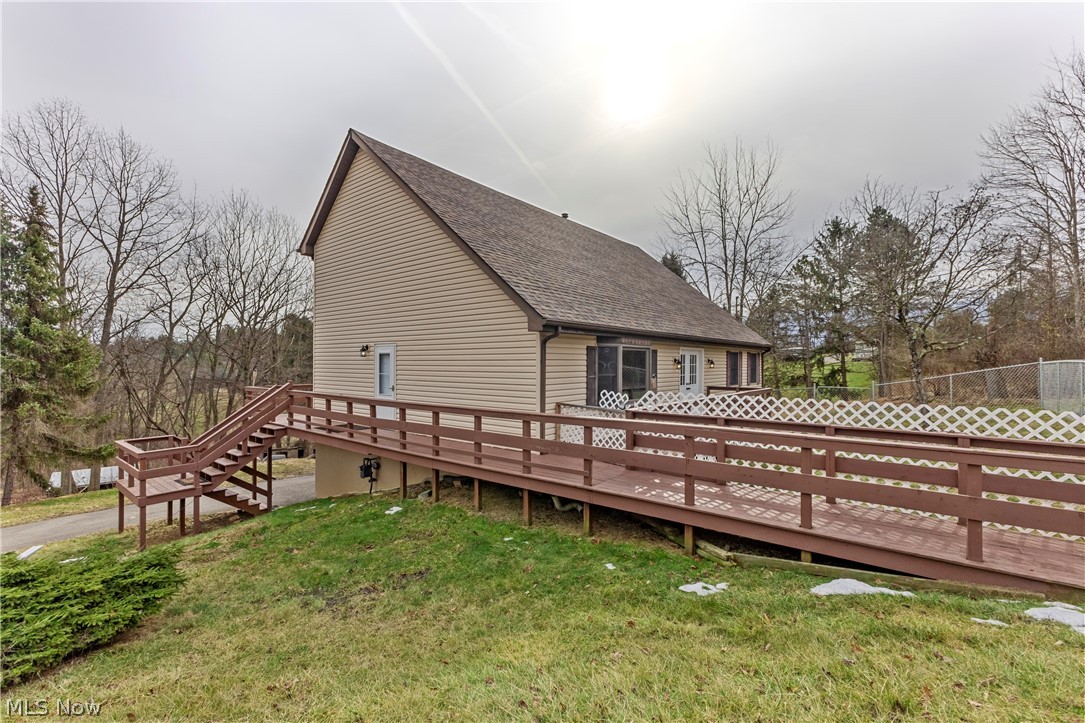 140 Iris Lane Colliers, WV 26035 - Photo 4 of 47 Back of house with a yard and a deck