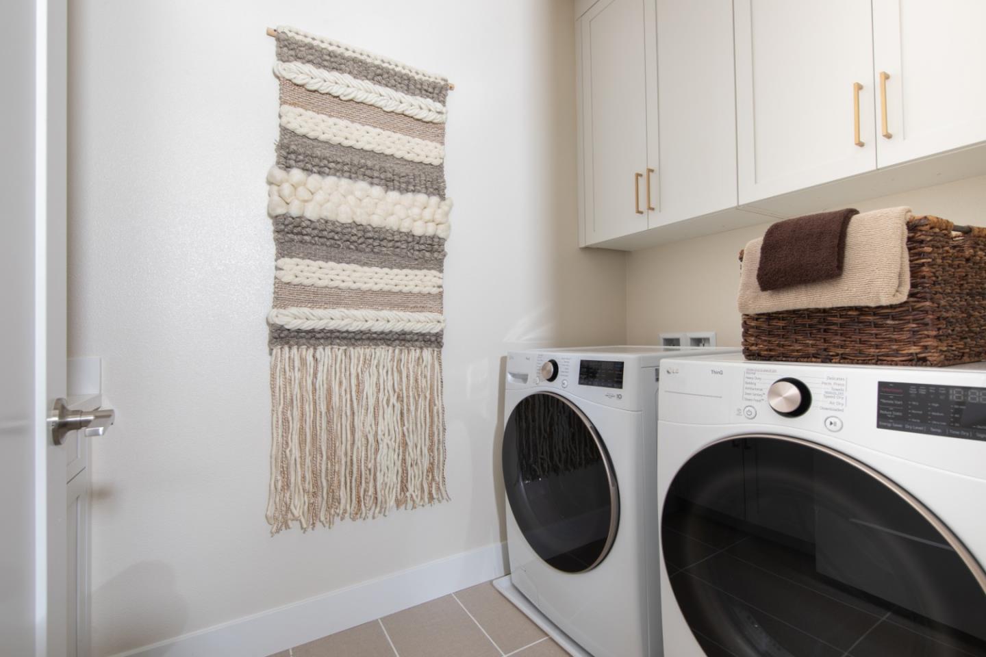 7351 Princevalle Street, Unit HOMESITE 18 Gilroy, CA 95020 - Photo 11 of 12 a view of livingroom with washer and dryer