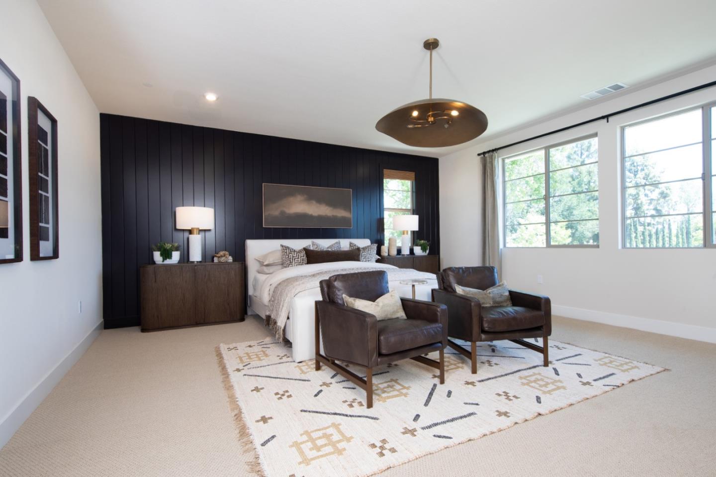 7351 Princevalle Street, Unit HOMESITE 18 Gilroy, CA 95020 - Photo 7 of 12 a living room with furniture and a flat screen tv