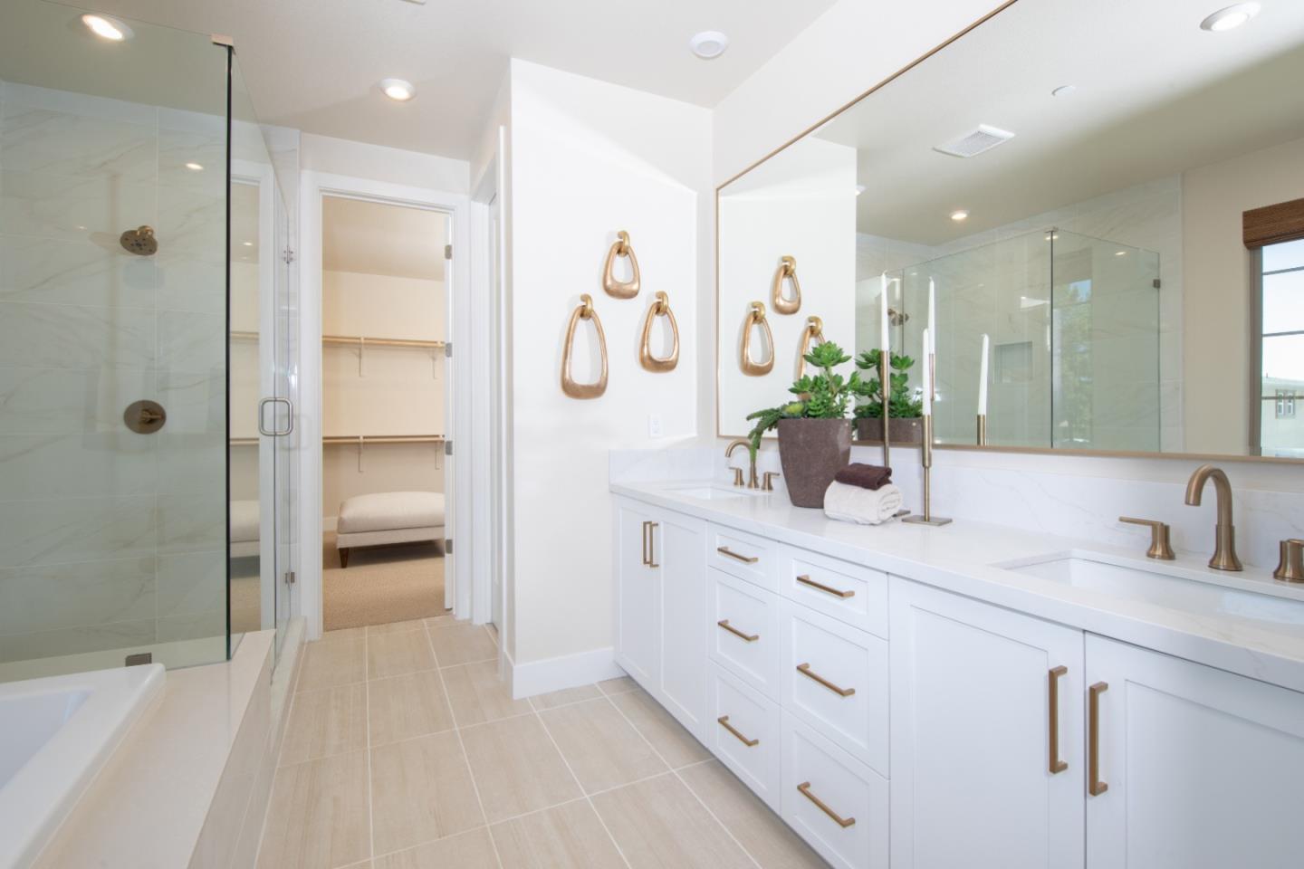 7351 Princevalle Street, Unit HOMESITE 18 Gilroy, CA 95020 - Photo 8 of 12 a bathroom with a double vanity sink mirror and shower