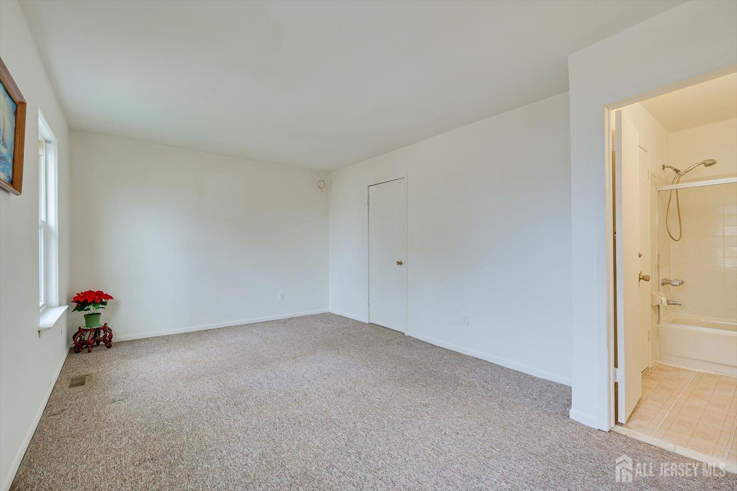 112 Redbud Road Piscataway, NJ 08854 - Photo 15 of 27 a view of a room with a window
