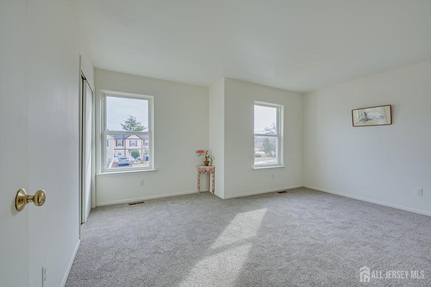 112 Redbud Road Piscataway, NJ 08854 - Photo 18 of 27 an empty room with windows