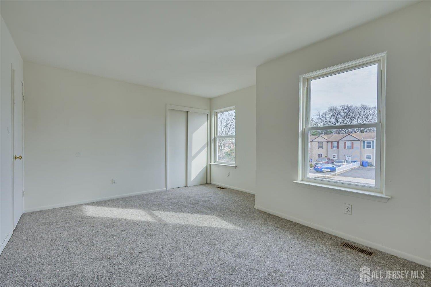 112 Redbud Road Piscataway, NJ 08854 - Photo 19 of 27 a view of an empty room with a window