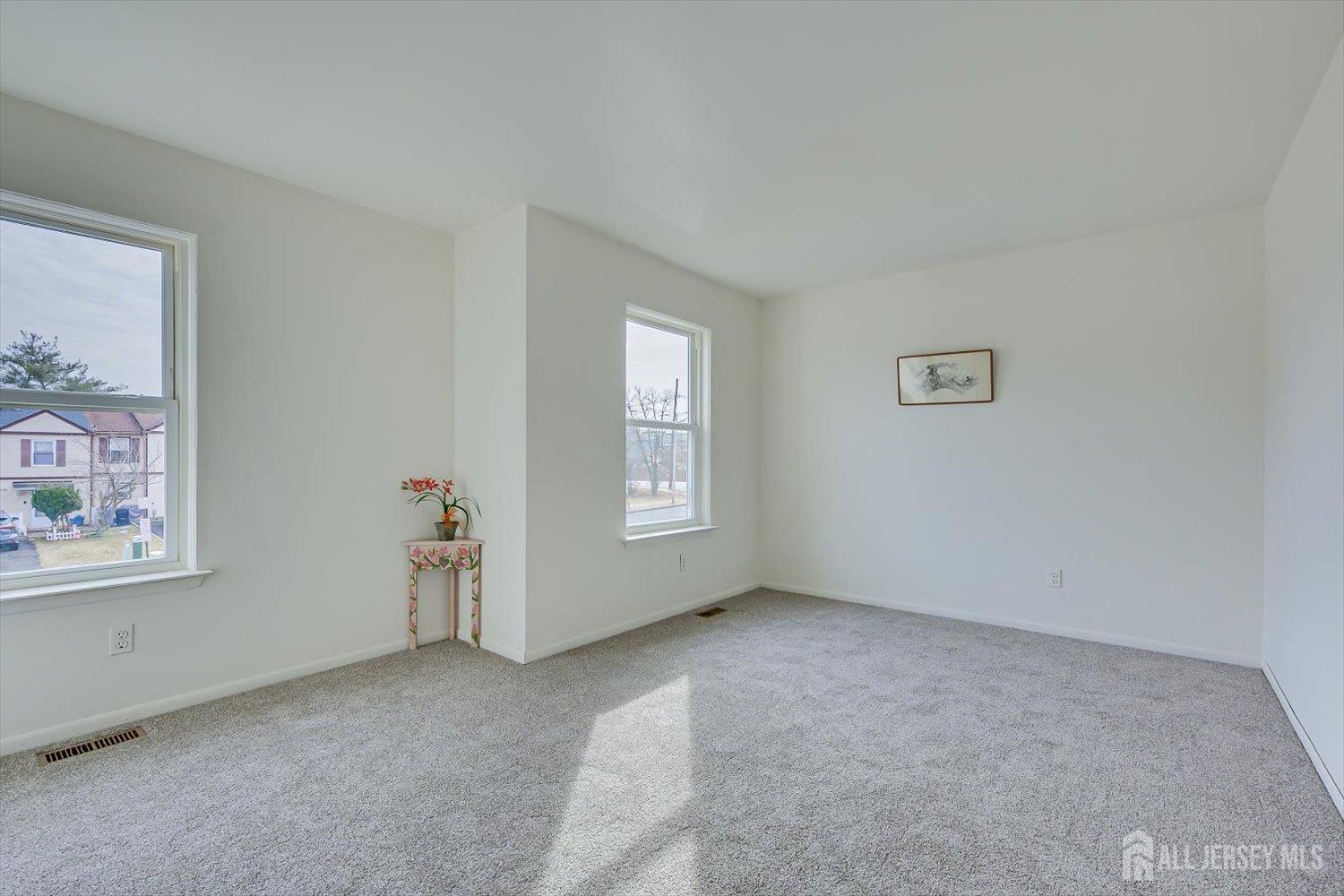 112 Redbud Road Piscataway, NJ 08854 - Photo 20 of 27 a view of an empty room with a window