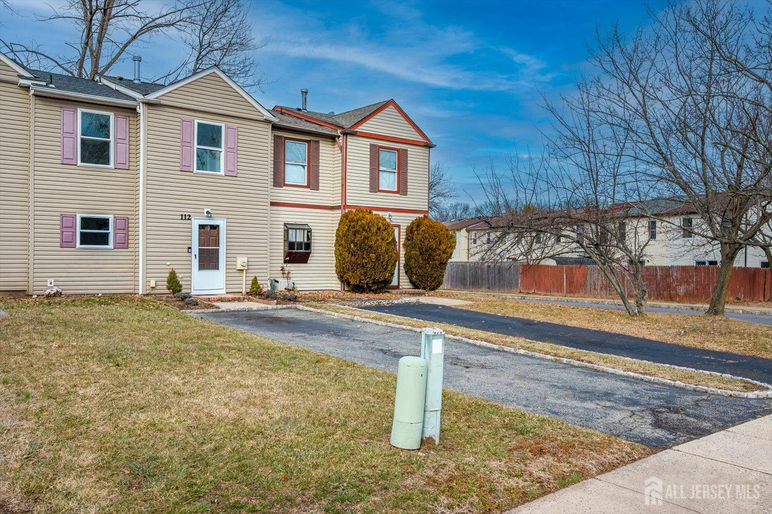112 Redbud Road Piscataway, NJ 08854 - Photo 2 of 27 a view of a house with wooden fence