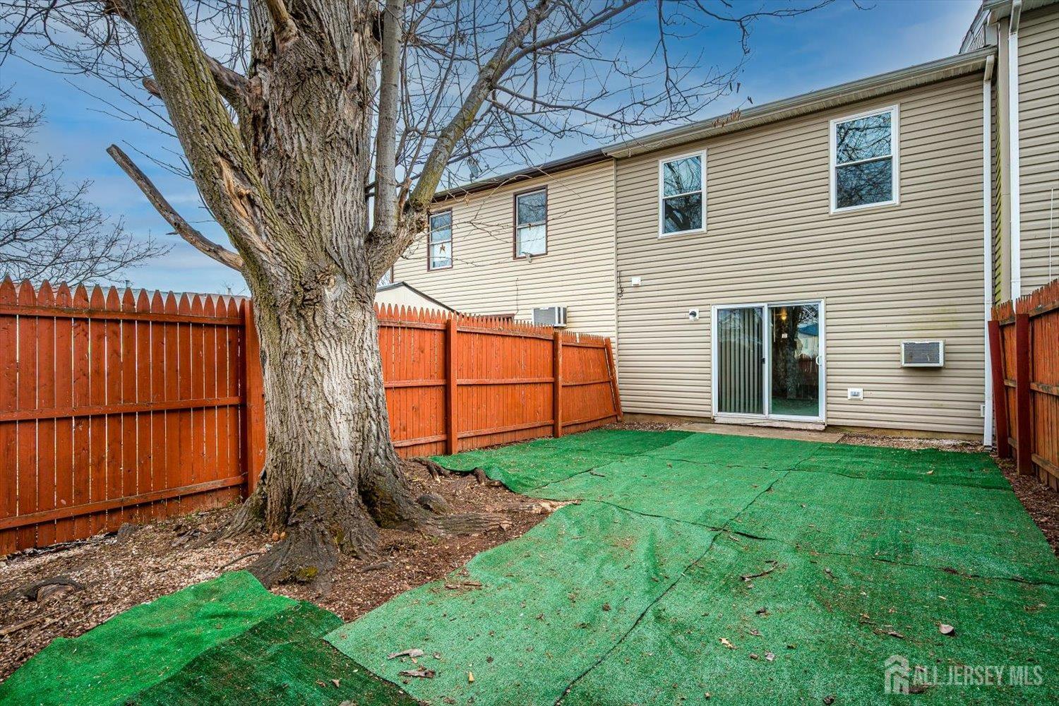 112 Redbud Road Piscataway, NJ 08854 - Photo 23 of 27 a backyard of a house with lots of green space