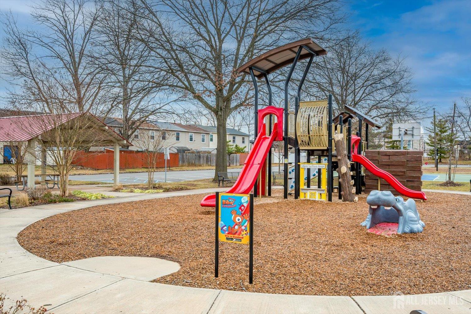 112 Redbud Road Piscataway, NJ 08854 - Photo 27 of 27 a view of a park with slide and a slide
