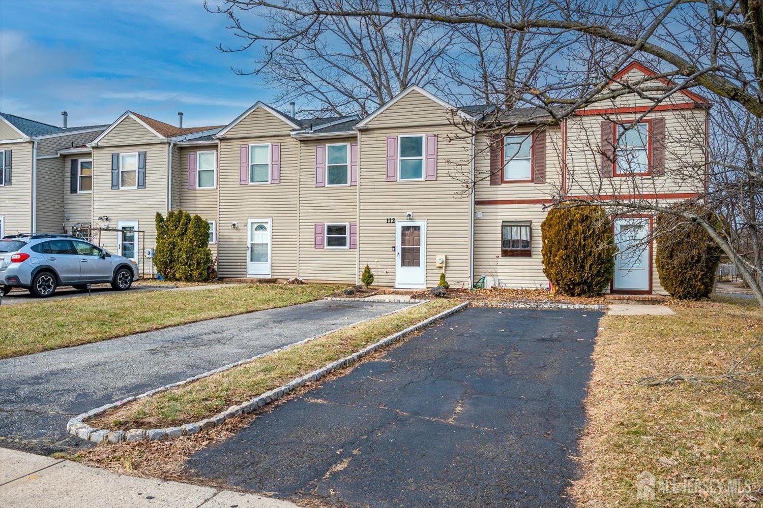 112 Redbud Road Piscataway, NJ 08854 - Photo 3 of 27 a front view of a house with a yard