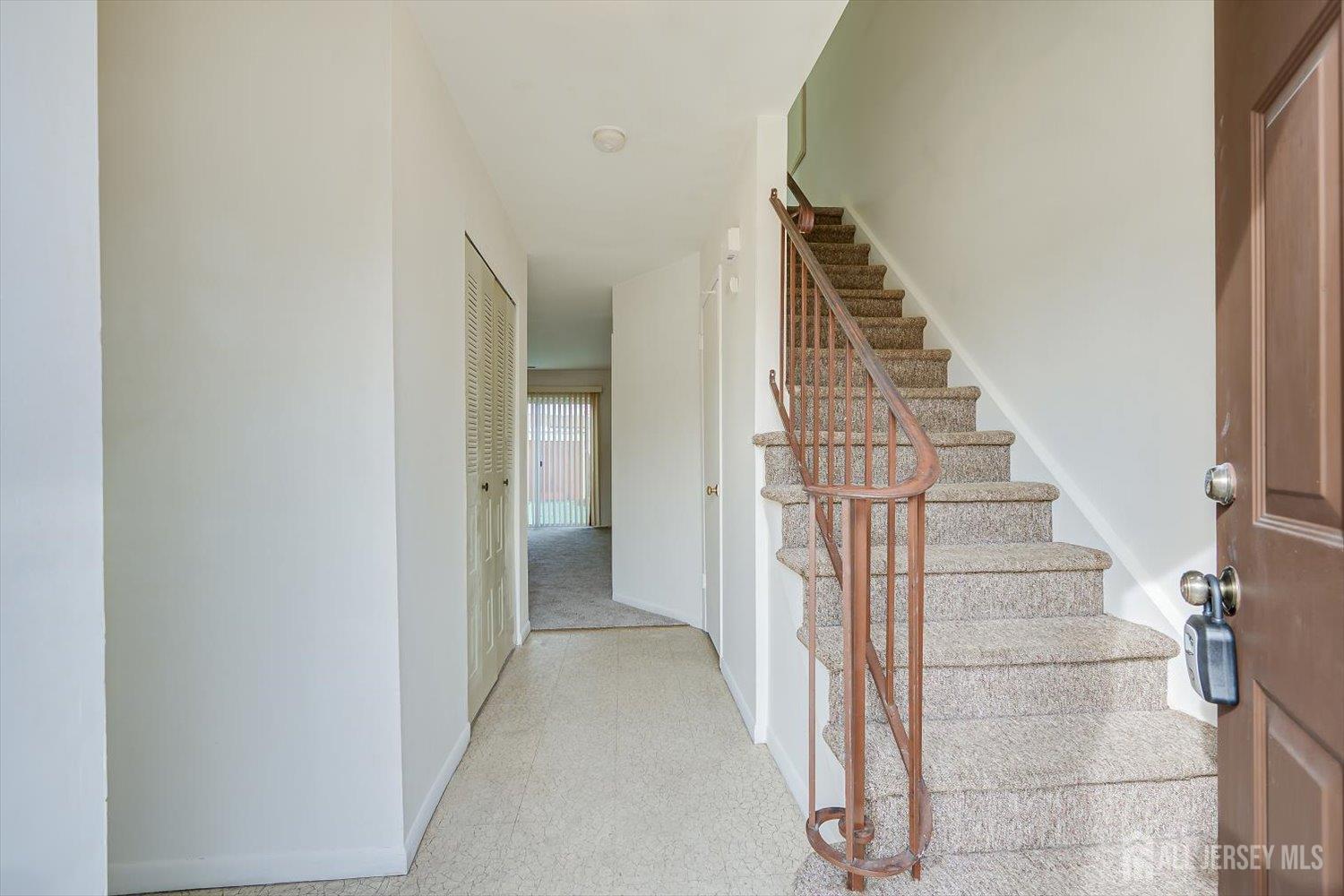 112 Redbud Road Piscataway, NJ 08854 - Photo 4 of 27 a view of entryway and gallery with wooden floor