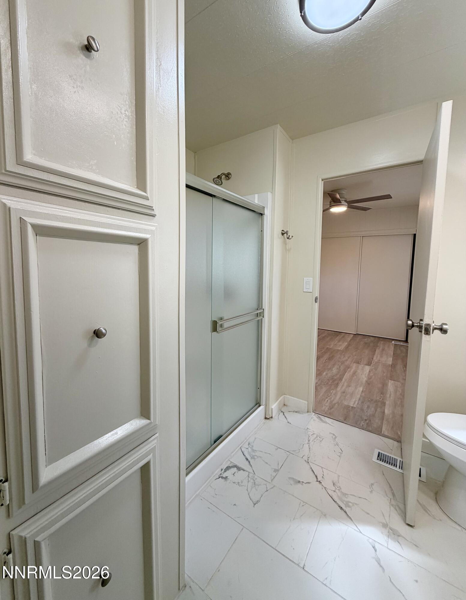 330 Taurus Circle Reno, NV 89521 - Photo 18 of 27 a bathroom with a sink and a mirror