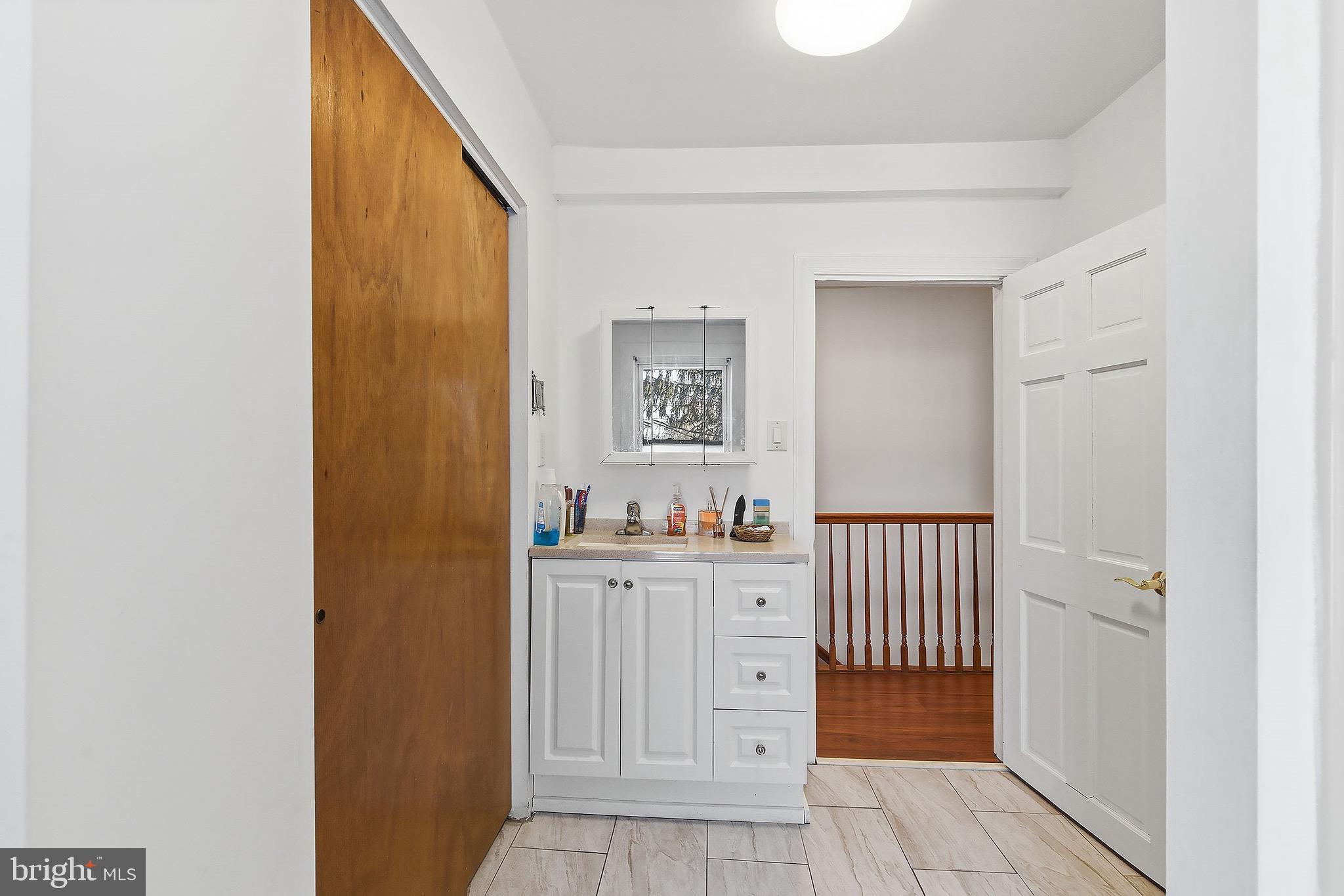 233 Ellis Street Burlington, NJ 08016 - Photo 18 of 36 a view of a hallway with closet area