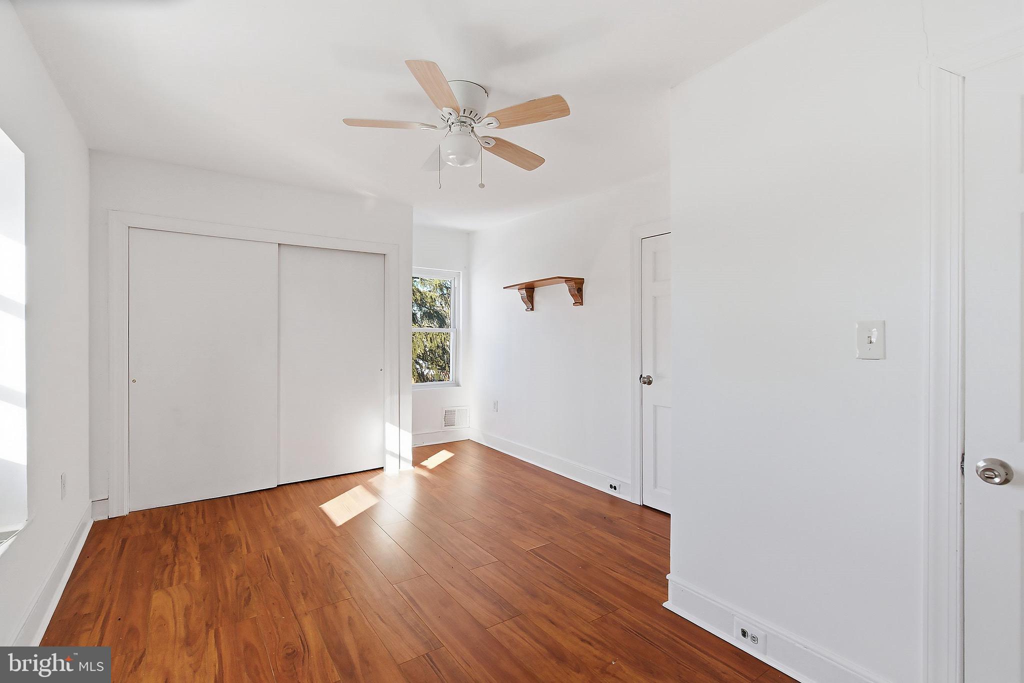 233 Ellis Street Burlington, NJ 08016 - Photo 20 of 36 a view of a room with wooden floor