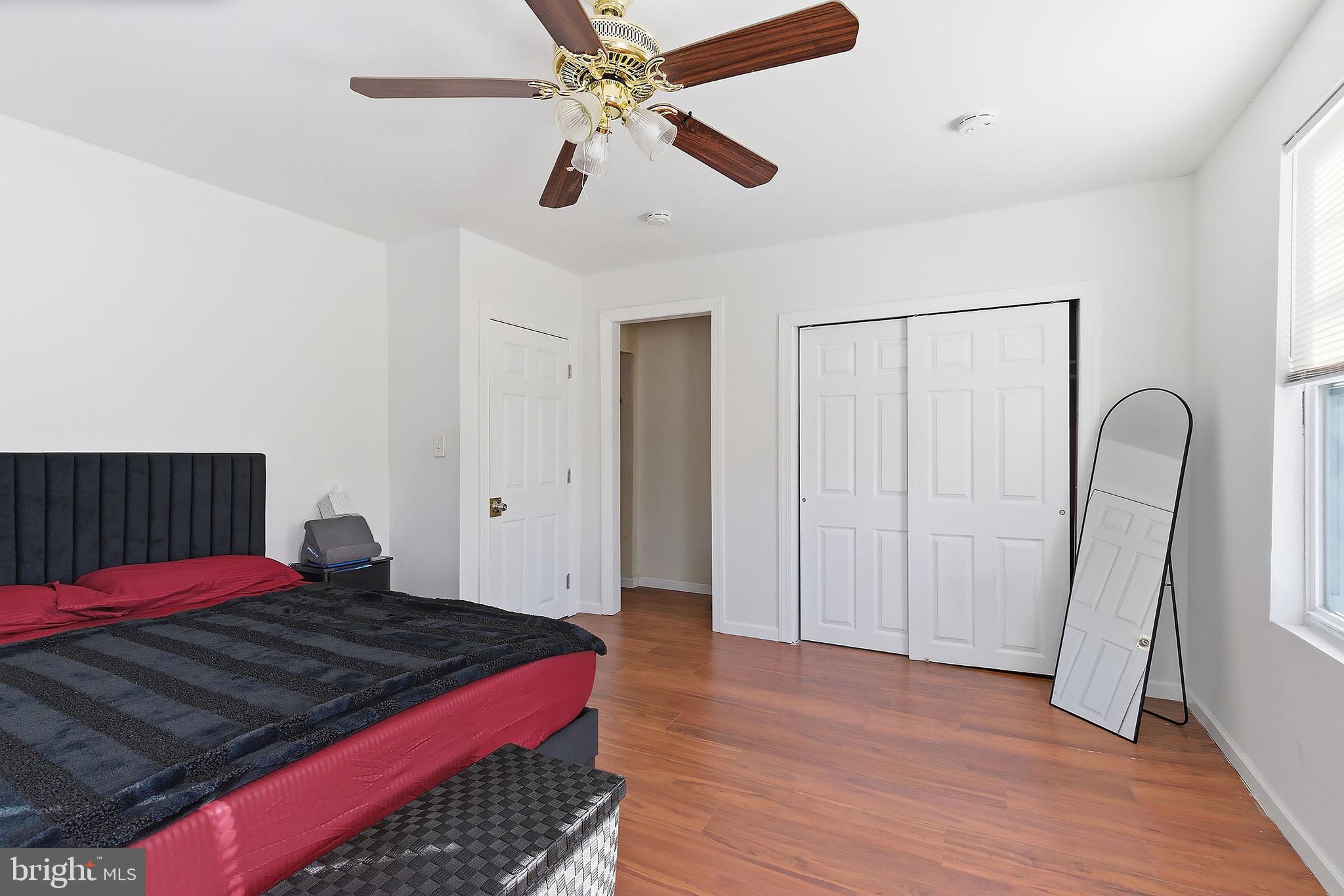 233 Ellis Street Burlington, NJ 08016 - Photo 25 of 36 a bedroom with a bed and a dresser