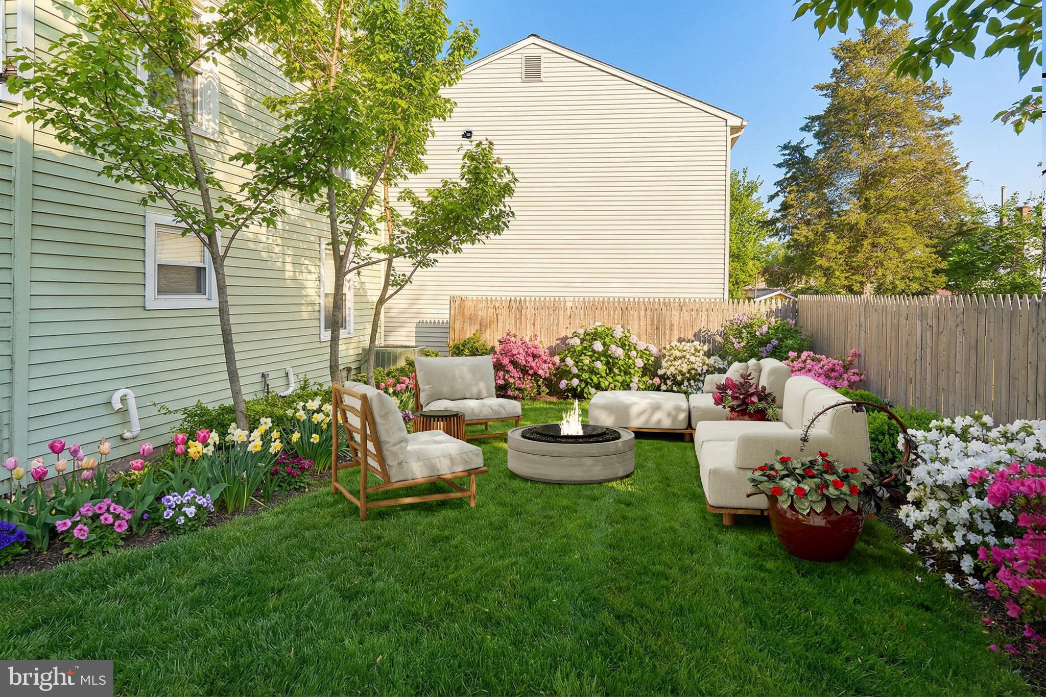 233 Ellis Street Burlington, NJ 08016 - Photo 30 of 36 a garden view with sitting space and garden