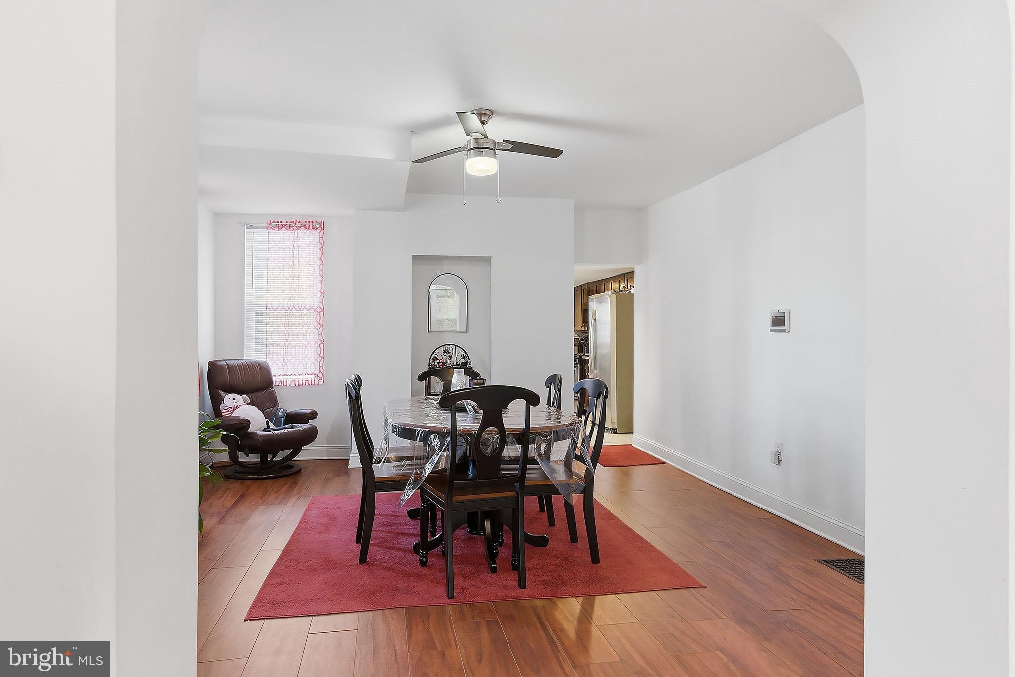 233 Ellis Street Burlington, NJ 08016 - Photo 3 of 36 a view of a dining room with furniture and wooden floor