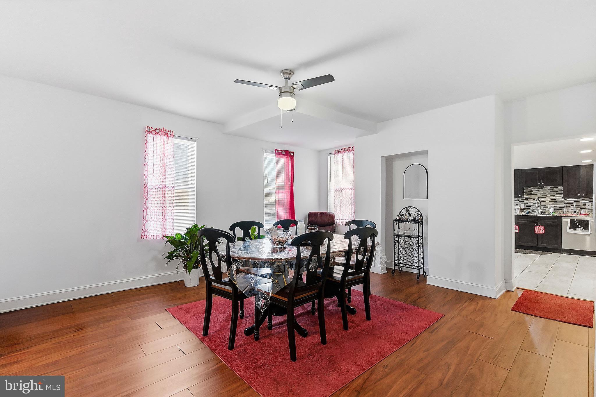 233 Ellis Street Burlington, NJ 08016 - Photo 4 of 36 a view of a dining room with furniture and wooden floor