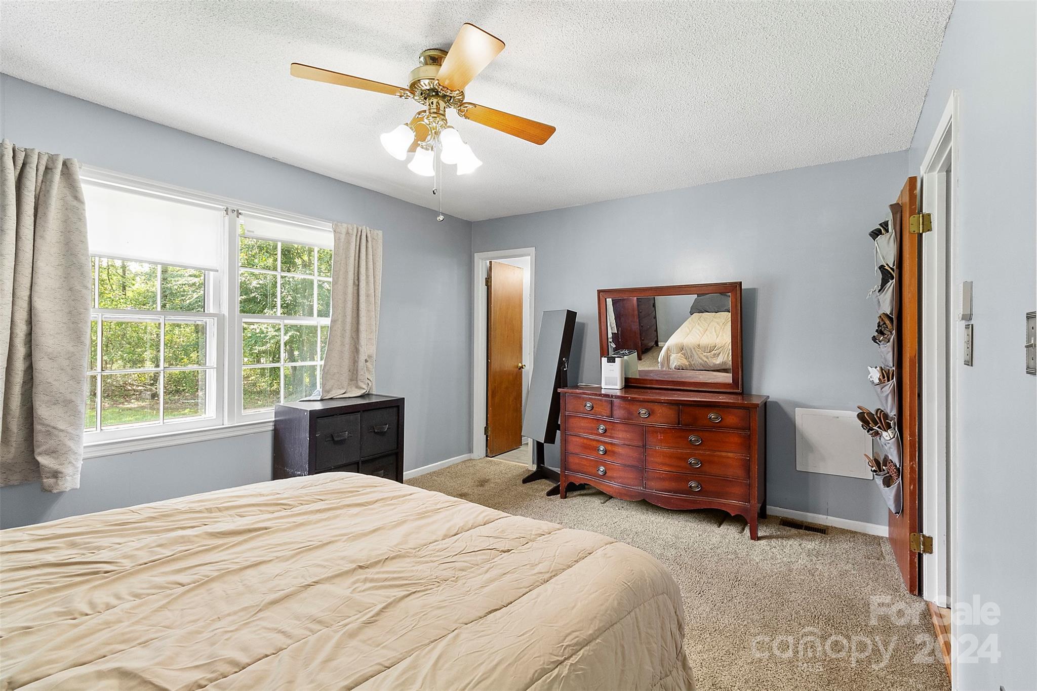 1220 Shiloh Ranch Road Lancaster, SC 29720 - Photo 23 of 35 a bedroom with a bed and a television